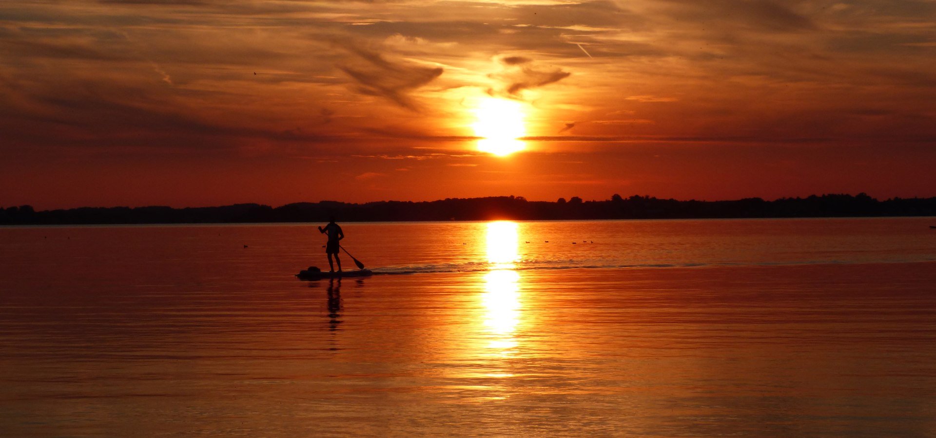 Standup Paddeling Chiemsee im Sonnenuntergang, © Janine Kather